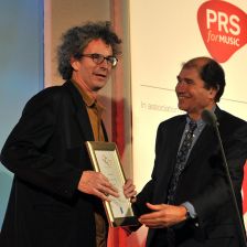 Orlando Gough accepts the Stage Works category award from host Michael Berkeley (photo: Mark Allan) Orlando Gough accepts the Stage Works category award from host Michael Berkeley