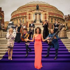 Proms presenter Katie Derham surrounded by some of this year's artists (photo: BBC / Robert Viglasky) Proms presenter Katie Derham and 2013 Proms artists (BBC / Robert Viglasky)