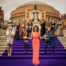 Proms presenter Katie Derham surrounded by some of this year's artists (photo: BBC / Robert Viglasky) BBC Proms reports record opening day ticket sales